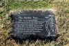 In this Thursday, March 5, 2020 photo, the marker celebrating The Hinkle Tree is pictured at the Inverness Club in Toledo, Ohio. The Black Hills spruce known as “The Hinkle Tree” was uprooted by a gust of wind this week. The tree dated to the 79th Open, when a journeyman pro named Lon Hinkle came up with a way to outsmart the course during the first round. (Jetta Fraser/The Blade via AP)