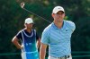 Rory McIlroy reacts after missing a birdie putt on his final hole of the day on the 9th green during the second round of the BMW Championship golf tournament, Friday, Aug. 28, 2020, at Olympia Fields Country Club in Olympia Fields, Ill. (AP Photo/Charles Rex Arbogast)