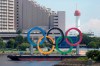 The Olympic rings float on a barge ahead of the 2020 Summer Olympics, Monday, July 19, 2021, in Tokyo. (AP Photo/Charlie Riedel)