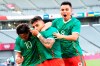 Mexico's Alexis Vega, center, celebrates his goal with teammates Carlos Rodriguez, right, and Diego Lainez during a men's soccer match against France at the 2020 Summer Olympics, Thursday, July 22, 2021, in Tokyo, Japan. (AP Photo/Shuji Kajiyama)
