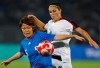 FILE - In this Aug. 18, 2008, file photo, Carli Loyd, right, of the U.S., vies for the ball with Mizuho Sakaguchi, of Japan, during the Beijing 2008 Olympics women semifinals soccer match in Beijing. Older Olympians will be proving that age is just a number in Tokyo. Lloyd is going to be 39 when she plays for the U.S. women's soccer team, but she's not even the oldest soccer player competing this summer. Formiga, who plays for Brazil, is 43. (AP Photo/Petr David Josek, File)