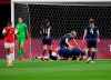 Players of Britain celebrate after Ellen White scoring their side's opening goal against Chile during a women's soccer match at the 2020 Summer Olympics, Wednesday, July 21, 2021, in Sapporo, Japan. (AP Photo/Silvia Izquierdo)