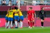 Brazil players celebrate after Marta scoring against China during a women's soccer match at the 2020 Summer Olympics, Wednesday, July 21, 2021, in Rifu, Japan. (AP Photo/Andre Penner)
