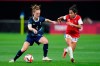 Britain's Keira Walsh and Chile's Yessenia Lopez compete for the ball during a women's soccer match at the 2020 Summer Olympics, Wednesday, July 21, 2021, in Sapporo, Japan. (AP Photo/Silvia Izquierdo)