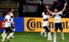 Vancouver Whitecaps forward Lucas Cavallini, right, celebrates with his teammates after scoring a goal during the first half of an MLS soccer match against Los Angeles FC in Portland, Ore., Wednesday, Oct. 14, 2020. (AP Photo/Steve Dykes)