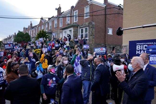Democratic presidential candidate former Vice President Joe Biden speaks to supporters during a stop in Philadelphia, Pa., Tuesday, Nov. 3, 2020. (AP Photo/Carolyn Kaster)