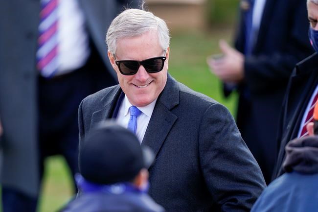 White House chief of staff Mark Meadows looks on before President Donald Trump speaks at a campaign rally at Keith House, Washington's Headquarters, Saturday, Oct. 31, 2020, in Newtown, Pa. (AP Photo/Chris Szagola)
