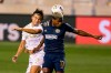 Atlanta United's Santiago Sosa, left, heads the ball away from Philadelphia Union's Sergio Santos, right, during the first half of a CONCACAF Champions League soccer match, Tuesday, May 4, 2021, in Chester, Pa. (AP Photo/Chris Szagola)
