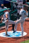 Miami Marlins' Brian Anderson, right, celebrates his two-run home run with Francisco Cervelli, left, during the fifth inning of a baseball game against the Philadelphia Phillies, Sunday, July 26, 2020, in Philadelphia. (AP Photo/Chris Szagola)