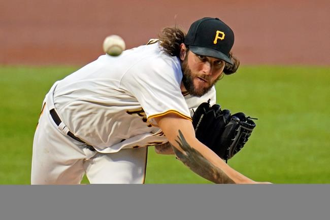 Pittsburgh Pirates starting pitcher Trevor Williams delivers during the first inning of the team's baseball game against the Cincinnati Reds in Pittsburgh, Saturday, Sept. 5, 2020. (AP Photo/Gene J. Puskar)