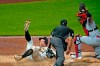 Pittsburgh Pirates' Bryan Reynolds, left, is tagged out by St. Louis Cardinals catcher Yadier Molina, right, with umpire Robert Ortiz preparing to make the call during the sixth inning of a baseball game in Pittsburgh, Thursday, Sept. 17, 2020. (AP Photo/Gene J. Puskar)