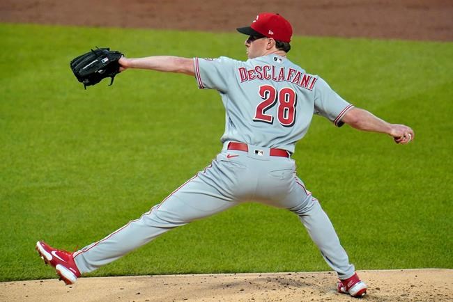 Cincinnati Reds starting pitcher Anthony DeSclafani throws during the first inning of the team's baseball game against the Pittsburgh Pirates in Pittsburgh, Saturday, Sept. 5, 2020. (AP Photo/Gene J. Puskar)