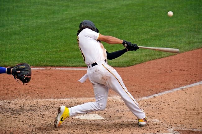 Pittsburgh Pirates' Cole Tucker drives in two runs with a single off Chicago Cubs relief pitcher Jason Adam during the sixth inning of a baseball game in Pittsburgh, Thursday, Sept. 3, 2020. (AP Photo/Gene J. Puskar)