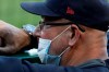 Cleveland Indians manager Terry Francona stands in the dugout during an exhibition baseball game against the Pittsburgh Pirates in Pittsburgh, Saturday, July 18, 2020. (AP Photo/Gene J. Puskar)