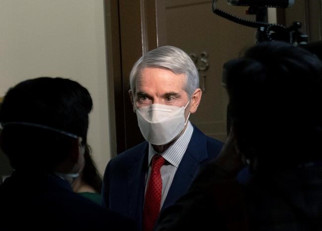 FILE - In this Jan. 19, 2021 file photo, Sen. Rob Portman, R-Ohio, speaks to members of the media outside a Senate Finance Committee hearing on Capitol Hill in Washington. Portman said Monday, Jan. 25 that he won't seek reelection and plans to end a career in federal government spanning more than three decades. (AP Photo/Andrew Harnik, File)