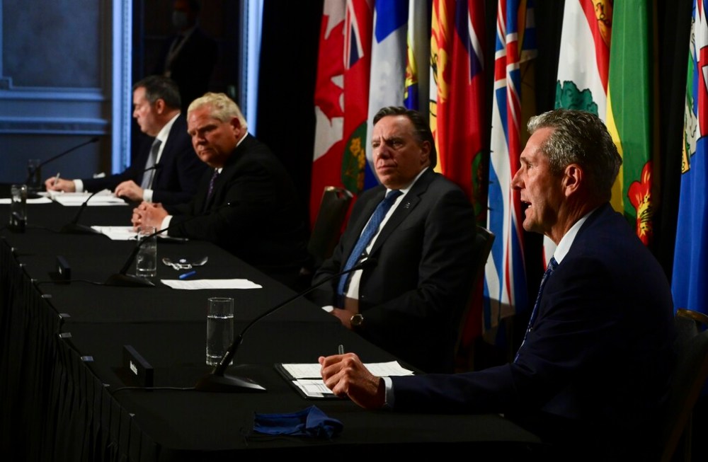 THE CANADIAN PRESS/Sean Kilpatrick
Manitoba Premier Brian Pallister, right, speaks as Quebec Premier Francois Legault looks on during a press conference in Ottawa last Friday. Legault met with Conservative Leader Erin O’Toole four days earlier, who later tested positive for COVID-19.
