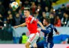 In this Thursday, Oct. 10, 2019 file photo Russia's Aleksandr Golovin, left, and Scotland's John Fleck challenge for the ball during the Euro 2020 group I qualifying soccer match between Russia and Scotland at the Luzhniki Stadium in Moscow, Russia. Aleksandr Golovin scored a hat trick and set up the other goal as Monaco won 4-3 at Nimes for a seventh straight win in the French league. Russia's midfield star from the 2018 World Cup put Monaco 2-0 up with identical-looking goals inside 11 minutes. (AP Photo/Alexander Zemlianichenko, File photo)