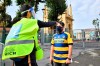 Soccer fans have their temperature checked as they arrive to the Ennio Tardini stadium prior to the start of the Serie A soccer match between Parma and Napoli, in Parma Sunday, Sept. 20, 2020. Up to 1,000 fans will be allowed into stadiums for Serie A matches from Sunday. The Italian government agreed to open the stadiums to a limited number of fans following a meeting between the health and sports ministers, and other politicians, on Saturday.(Massimo Paolone/LaPresse via AP)