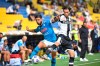 Napoli's Lorenzo Insigne, left, competes for the ball with Parma's Matteo Darmian during the Serie A soccer match between Parma and Napoli at the Ennio Tardini stadium in Parma, Italy, Sunday, Sept. 20, 2020. (Massimo Paolone/LaPresse via AP)