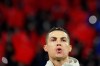 Juventus' Cristiano Ronaldo warms up prior to a round of sixteen, first leg, soccer match between Lyon and Juventus at the at the Lyon Olympic Stadium in Decines, outside Lyon, France, Wednesday, Feb. 26, 2020. (AP Photo/Laurent Cipriani)