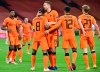 Netherlands' Luuk de Jong, center right, hugs Netherlands' Georginio Wijnaldum who scored his side's first goal during the UEFA Nations League soccer match between The Netherlands and Bosnia and Herzegovina at the Johan Cruyff ArenA in Amsterdam, Netherlands, Sunday, Nov. 15, 2020. (John Thys/Pool via AP)