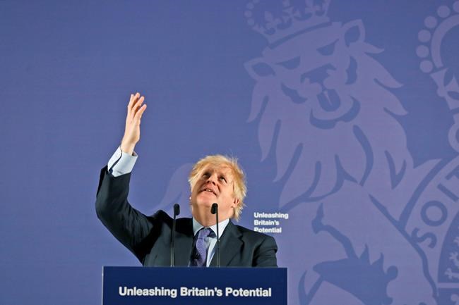 British Prime Minister Boris Johnson outlines his government's negotiating stance with the European Union after Brexit, during a key speech at the Old Naval College in Greenwich, London, Monday, Feb. 3, 2020. (AP Photo/Frank Augstein, Pool)