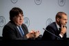 UEFA's Interim General Secretary Theodore Theodoridis, left, washes his hand with a sanitizing gel during a press conference with President Aleksander Ceferin, right, following a meeting of European soccer leaders at the congress of the UEFA governing body in Amsterdam's Beurs van Berlage, Netherlands, Tuesday, March 3, 2020. (AP Photo/Peter Dejong)