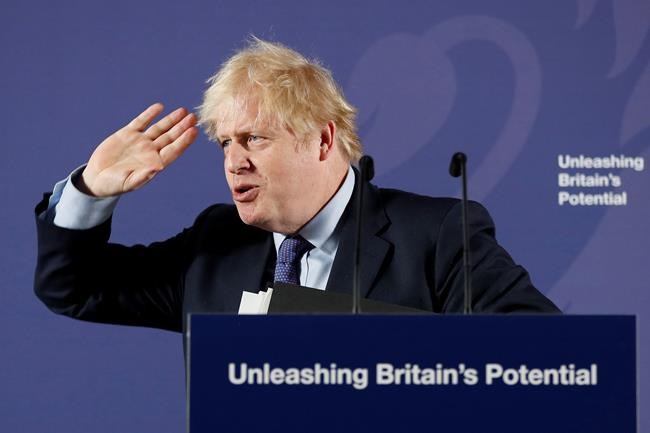 British Prime Minister Boris Johnson outlines his government's negotiating stance with the European Union after Brexit, during a key speech at the Old Naval College in Greenwich, London, Monday, Feb. 3, 2020. (AP Photo/Frank Augstein, Pool)