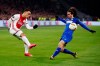 Ajax's Sergino Dest, left, and Getafe's Marc Cucurella vie for the ball during a round of 32, second leg, Europa League soccer match between Ajax and Getafe at the Johan Cruyff ArenA in Amsterdam, Netherlands, Thursday, Feb. 27, 2020. (AP Photo/Peter Dejong)