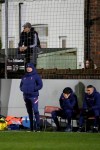 Tottenham's manager Jose Mourinho, standing, watches during the English FA Cup third round soccer match between Marine and Tottenham Hotspur at Rossett Park stadium in Crosby, Liverpool, Sunday, Jan. 10, 2021. (Clive Brunskill/Pool via AP)