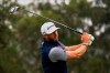 Dustin Johnson watches his tee shot on the fourth hole during the final round of the PGA Championship golf tournament at TPC Harding Park Sunday, Aug. 9, 2020, in San Francisco. (AP Photo/Jeff Chiu)