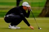 Li Haotong of China, lines up a putt on the second hole during the third round of the PGA Championship golf tournament at TPC Harding Park Saturday, Aug. 8, 2020, in San Francisco. (AP Photo/Jeff Chiu)