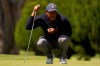 Tiger Woods lines up a putt on the third hole during the second round of the PGA Championship golf tournament at TPC Harding Park Friday, Aug. 7, 2020, in San Francisco. (AP Photo/Jeff Chiu)