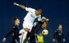 In this file picture taken on Thursday, Feb. 21, 2019, Plzen midfielder Jean-David Beauguel, center, jumps for the ball with Dinamo Zagreb's Amer Gojak, right, during the Europa League round of 32 second leg soccer match between Dinamo Zagreb and Viktoria Plzen at Maksimir Stadium in Zagreb, Croatia. On Monday June 15, 2020, the top Czech league has condemned racist abuse of a player by fans during a league game. The incident occurred on Sunday at the game between Olomouc and Plzen when several fans directed racist insults at Plzen striker Jean-David Beauguel who is black. The 28-year-old is a French national. (AP Photo/Darko Bandic/File)