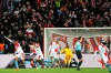 FILE - In this file photo taken on Thursday, March 14, 2019, Slavia's Ibrahim-Benjamin Traore, left, celebrates scoring the decisive goal during their Europa League Round of 16 second leg soccer match between Slavia Praha and Sevilla in Prague, Czech Republic. The professional clubs in the top two soccer divisions in the Czech Republic approved on Tuesday, May 12, 2020 a restart of their competitions that were interrupted by the pandemic of the coronavirus. The first game in the first division will be a match delayed from a previous round of matches between Teplice and Liberec on May 23. The second division will kick off the following week. (AP Photo/Petr David Josek, File)