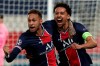 PSG's Marquinhos, right, celebrates with PSG's Neymar after scoring his sides first goal during the Champions League semifinal first leg soccer match between Paris Saint Germain and Manchester City at the Parc des Princes stadium, in Paris, France , Wednesday, April 28, 2021. (AP Photo/Thibault Camus)