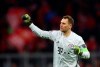 Bayern's goalkeeper Manuel Neuer celebrates after Bayern's Thomas Mueller scored his teams second goal during the Champions League group B soccer match between Bayern Munich and Tottenham Hotspur at the Allianz Arena stadium, in Munich, Wednesday, Dec. 11, 2019. (AP Photo/Matthias Schrader)