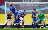 Brighton's Lewis Dunk scores his sides first goal during the English Premier League soccer match between Burnley and Brighton at Turf Moor stadium in Burnley, England, Saturday, Feb. 6, 2021. (Laurence Griffiths/Pool via AP)