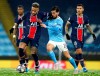Manchester City's Bernardo Silva, center, challenges PSG's Neymar during the Champions League semifinal second leg soccer match between Manchester City and Paris Saint Germain at the Etihad stadium, in Manchester, Tuesday, May 4, 2021. (AP Photo/Dave Thompson)
