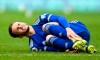 Leicester's James Maddison grimaces after suffering an injury during the English Premier League soccer match between Aston Villa and Leicester City at Villa Park in Birmingham, England, Sunday, Feb. 21, 2021. (AP Photo/Michael Regan, Pool)
