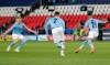 Manchester City's Riyad Mahrez, right, celebrates with teammates after scoring his sides second goal during the Champions League semifinal first leg soccer match between Paris Saint Germain and Manchester City at the Parc des Princes stadium, in Paris, France , Wednesday, April 28, 2021. (AP Photo/Thibault Camus)