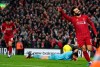 Liverpool's Mohamed Salah celebrates after scoring his sides fourth goal during the English Premier League soccer match between Liverpool and Southampton at Anfield Stadium, Liverpool, England, Saturday, February 1, 2020. (AP Photo/Jon Super)