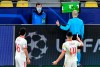 Referee Cunyet Cakir watches VAR during the Champions League, round of 16, second leg soccer match between Borussia Dortmund and Sevilla FC in Dortmund, Germany, Tuesday, March 9, 2021. (AP Photo/Martin Meissner, Pool)