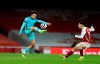 Arsenal's Gabriel Martinelli, right, challenges Liverpool's Trent Alexander-Arnold during the English Premier League soccer match between Arsenal and Liverpool at the Emirates Stadium in London, England, Saturday, April 3, 2021. (Adam Davy/Pool via AP)