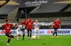 Manchester United's Bruno Fernandes scores his sides first goal from a penalty kick during the UEFA Europa League quarterfinal soccer match between Manchester United and FC Copenhagen in Cologne, Germany, Monday, Aug. 10, 2020. (Wolfgang Rattay/Pool via AP)