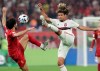 Flamengo's Willian Arao, right, challenges Liverpool's Mohamed Salah, left, during the Club World Cup final soccer match between Liverpool and Flamengo at Khalifa International Stadium in Doha, Qatar, Saturday, Dec. 21, 2019. (AP Photo/Hassan Ammar)