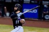 Colorado Rockies' Kevin Pillar watches his three-run double against the Arizona Diamondbacks during the second inning of the second game of a baseball doubleheader Friday, Sept. 25, 2020, in Phoenix. (AP Photo/Ross D. Franklin)