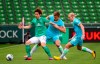 Bremen's Japanese forward Yuya Osako, Wolfsburg's Croatian defender Marin Pongracic and Wolfsburg's Austrian midfielder Xaver Schlager , from left,vie for the ball during the German Bundesliga soccer match between Werder Bremen and VfL Wolfsburg in Bremen, Germany, Sunday, June 7, 2020. (Patrick Stollarz, Pool via AP)