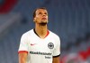 Eintracht Frankfurt's Timothy Chandler wearing a shirt referencing the Black Lives Matter campaign during the German soccer cup semi-final match between Bayern Munich and Eintracht Frankfurt in Munich, Germany, Wednesday, June 10, 2020. (Kai Pfaffenbach/Pool via AP)