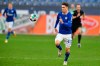 File---File picture taken Jan.24, 2021 shows Schalke's Matthew Hoppe eying the ball during the German Bundesliga soccer match between FC Schalke 04 and Bayern Munich in Gelsenkirchen, Germany. (AP Photo/Martin Meissner)